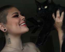 She is a pet lover and has a black cat.
